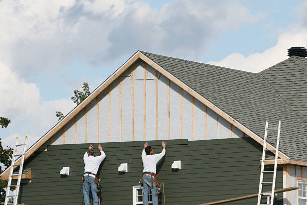 Professional Siding technician working in Hamden, CT